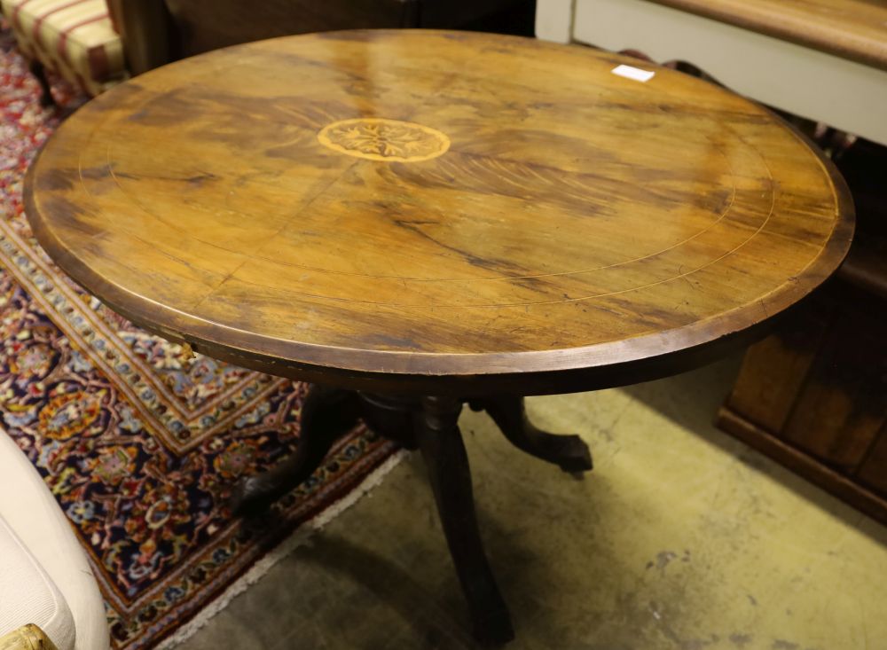 A Victorian inlaid walnut oval topped tea table, width 104cm, depth 72cm, height 71cm, no bolts